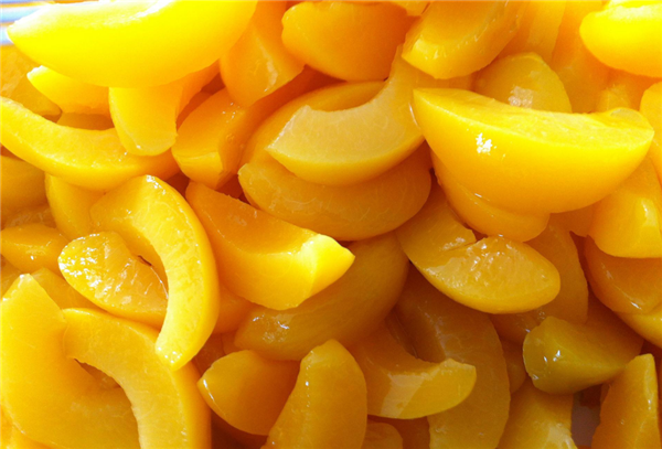 黄桃罐头上火还是降火,黄桃罐头甜度高多吃不好