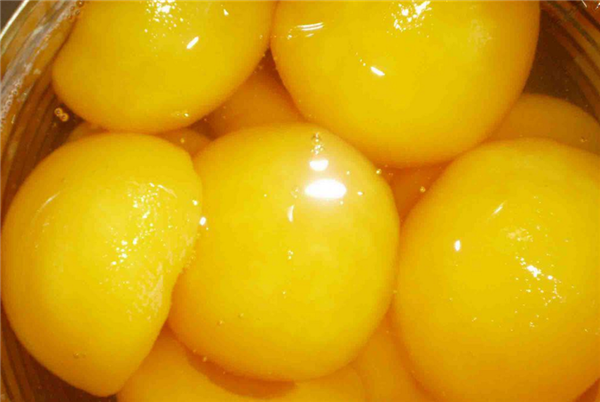 黄桃罐头上火还是降火,黄桃罐头甜度高多吃不好
